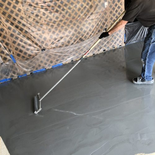 Garage floor coating process - Epoxy Base Coat